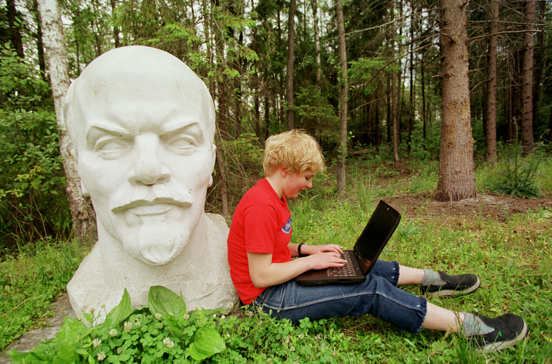 A statue of Lenin relocated to Gruto Park, a sculpture garden of discarded Soviet-era statuary in Lithuania. Photo via Getty Images.